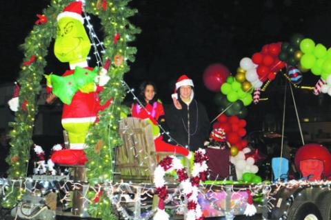 Similar to last year, parade floats and entries will have Christmas lights shiny and bright as they walk the route through downtown Elgin. File photo