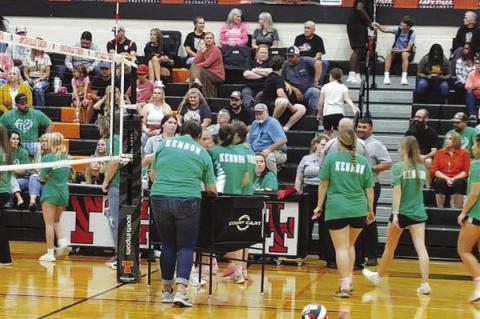 Teacher honored at volleyball game