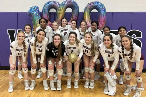 Bastrop High School varsity volleyball senior Fallon Hall and her teammates gather for a photo on Sept. 22 to celebrate 1,000 career assists, which she achieved during the Lady Bears’ match victory at Elgin High School. Photo courtesy of Morgan Rollins