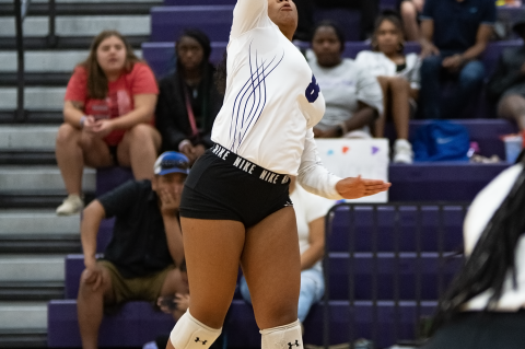 Elgin varsity volleyball junior Kay-Nicole Lester powerfully spikes the ball on Aug. 25 during the Lady Wildcats’ home match vs. Meridian World School. Photo by Marcial Guajardo