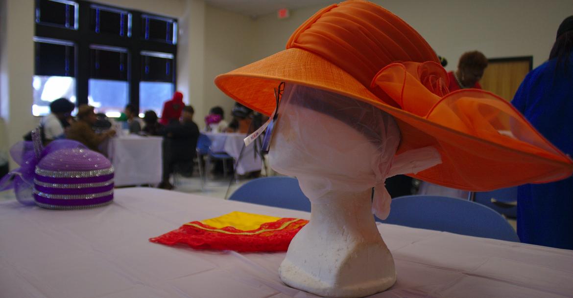 Hats for sale, such as this one, were arranged on some of the tables.