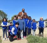  Charles Wilson with his second and third graders, out for recess in their custom TNT Academy jackets. Photo by Niko Demetriou