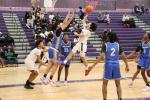 Elgin High School boys varsity basketball sophomore Tyson McFarlin puts up an acrobatic shot Jan. 17 during the Wildcats’ 66-52 victory at home versus Pflugerville High School. Photo by Jack Grames